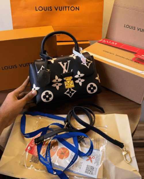 Shop Authentic Louis Vuitton Madeleine Handbag | First Copy